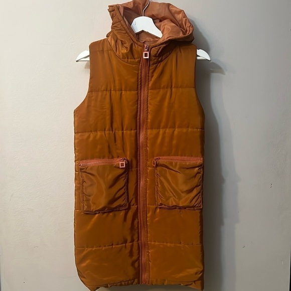 Unbranded orange puffer vest pit to pit 19”
Length 32” - Picture 1 of 8